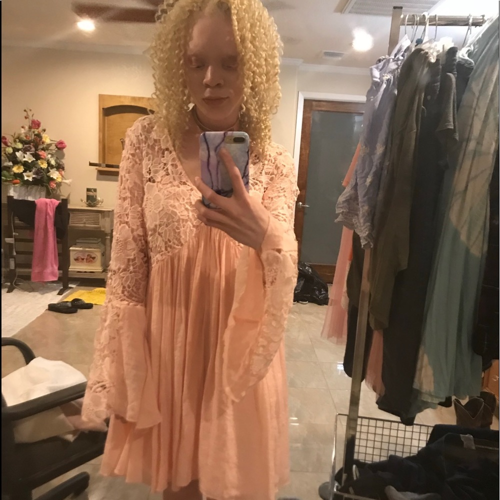 Light pink dress with long laced sleeves